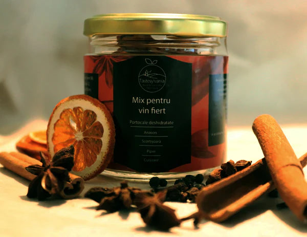 Condiment pentru vin fiert cu portocale deshidratate, baton de scorțișoară, anason, cuișoare, piper negru